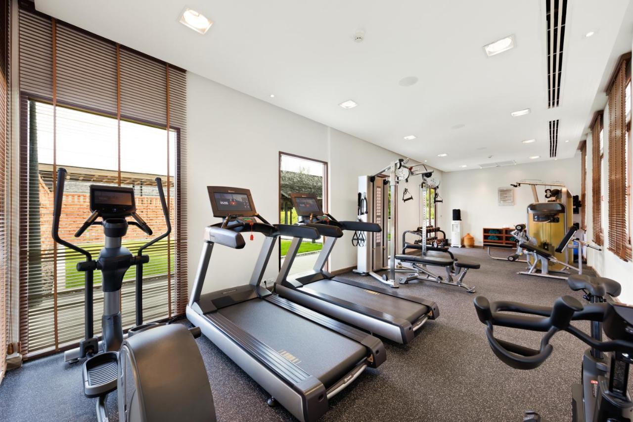 Outrigger Khao Lak Beach Resort - Sha Extra Plus Bagian luar foto The gym at the hotel