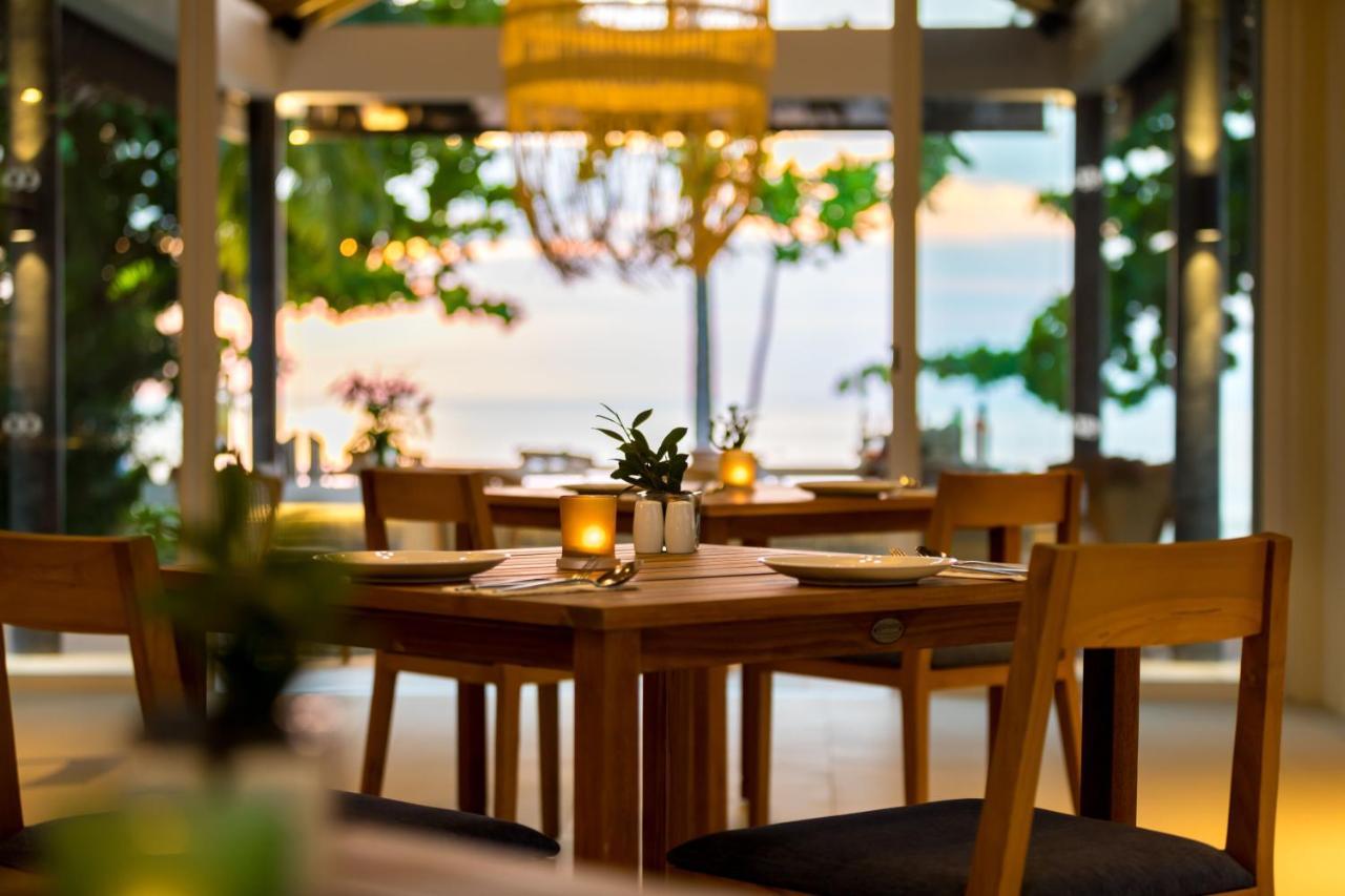 Outrigger Khao Lak Beach Resort - Sha Extra Plus Bagian luar foto The restaurant at the resort