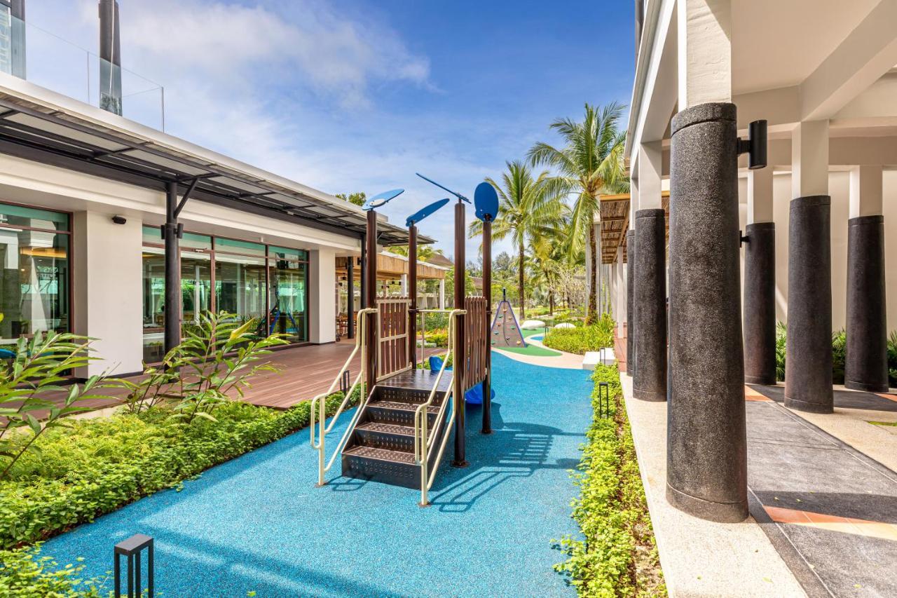 Outrigger Khao Lak Beach Resort - Sha Extra Plus Bagian luar foto Playground at the school