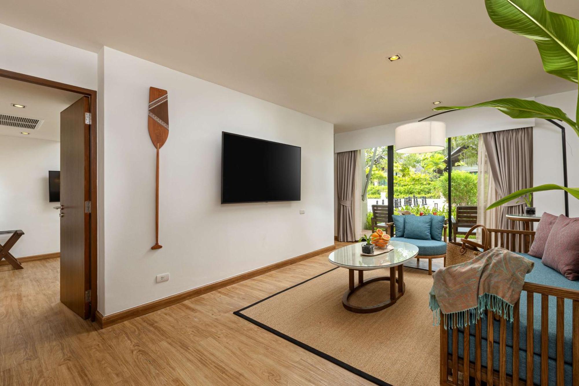 Outrigger Khao Lak Beach Resort - Sha Extra Plus Bagian luar foto Living room of a two-bedroom villa